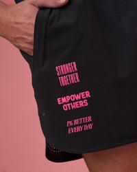 Man wearing Lift 6" Short - Black-Ultra Pink | Model:Brandon | Size:L