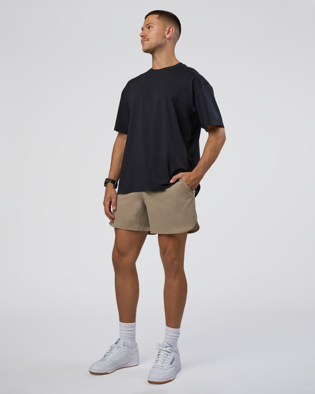 Man wearing Lifting Club FLXCotton Tee Oversize - Black-Black | Model:Nikola | Size:L