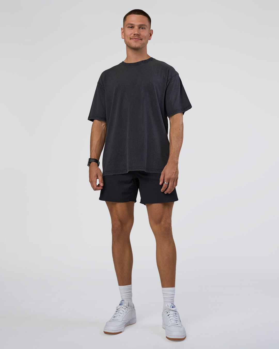 Man wearing Lifting Club FLXCotton Tee Oversize - Black Washed | Model:Nikola | Size:L