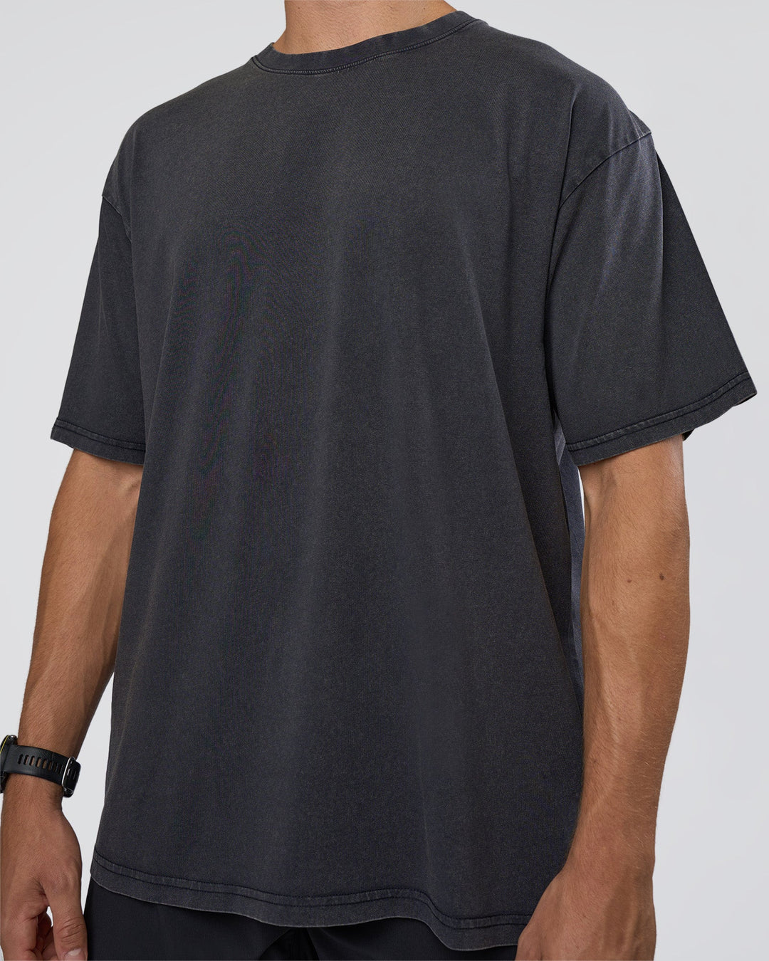 Man wearing Lifting Club FLXCotton Tee Oversize - Black Washed | Model:Nikola | Size:L