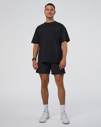 Man wearing Lifting Club FLXCotton Tee Oversize - Black-White-Red | Model:Nikola | Size:L