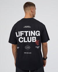 Man wearing Lifting Club FLXCotton Tee Oversize - Black-White-Red | Model:Nikola | Size:L