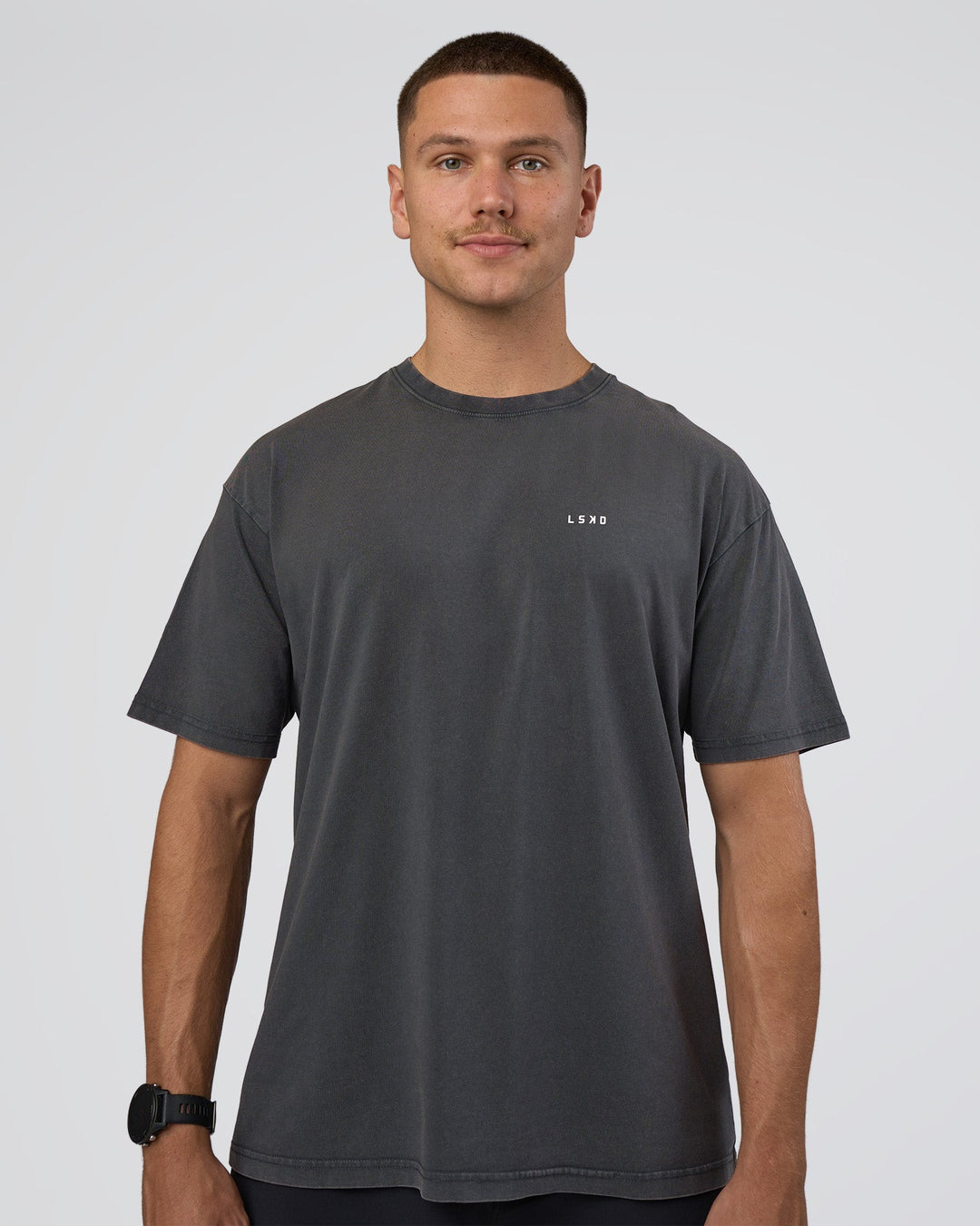 Man wearing Lifting FLXCotton Oversized Tee - Black Washed-Flame | Model:Nikola | Size:L - view 3
