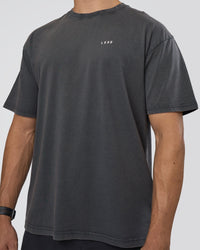 Man wearing Lifting FLXCotton Oversized Tee - Black Washed-Flame | Model:Nikola | Size:L