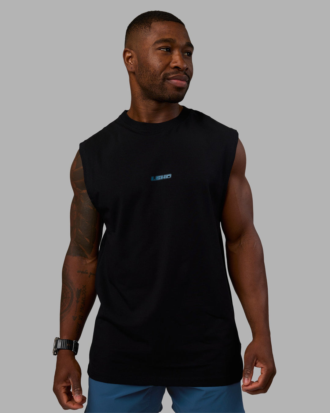 Man wearing Lifting Heavyweight FLXCotton Tank - Black-Blue Coral | Model:Sam | Size:L