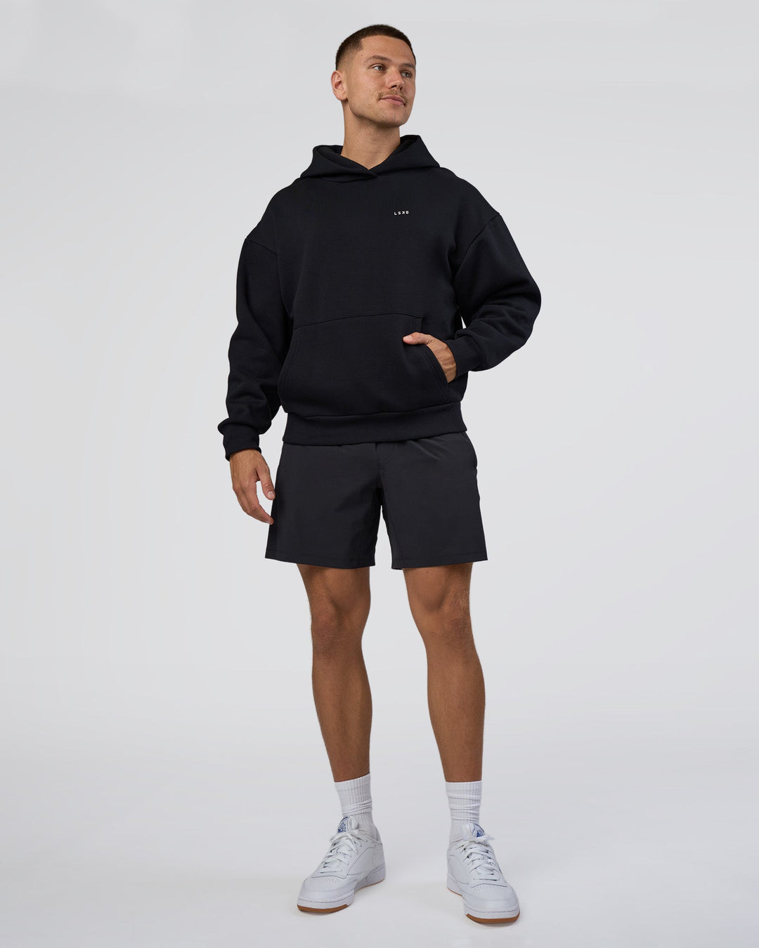 Man wearing Lifting Unisex Oversized Hoodie - Black-Flame| Model:Nikola | Size:L