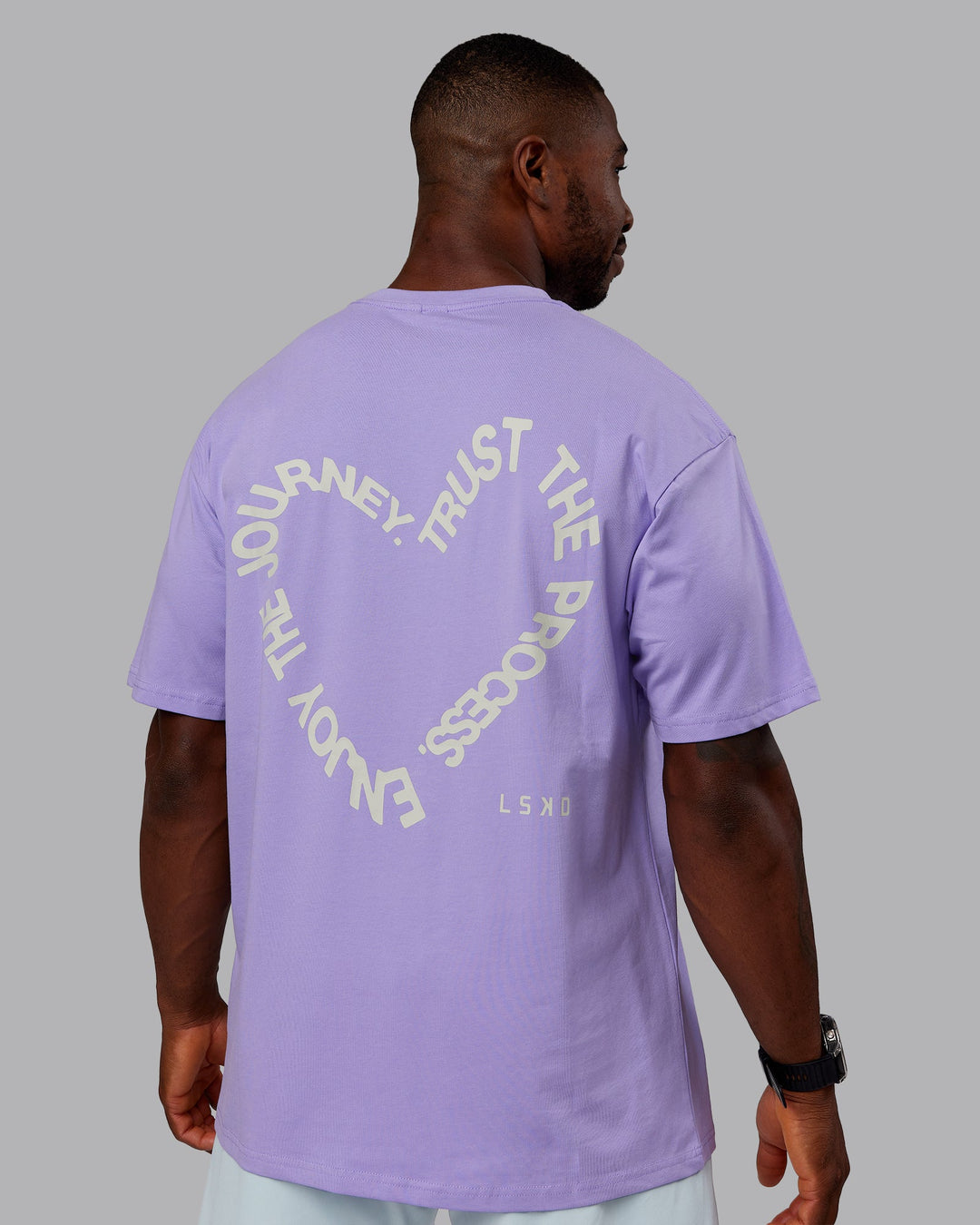 Man wearing Love The Process FLXCotton Oversize Tee - Violet Ray-Bone | Model:Sam | Size:L