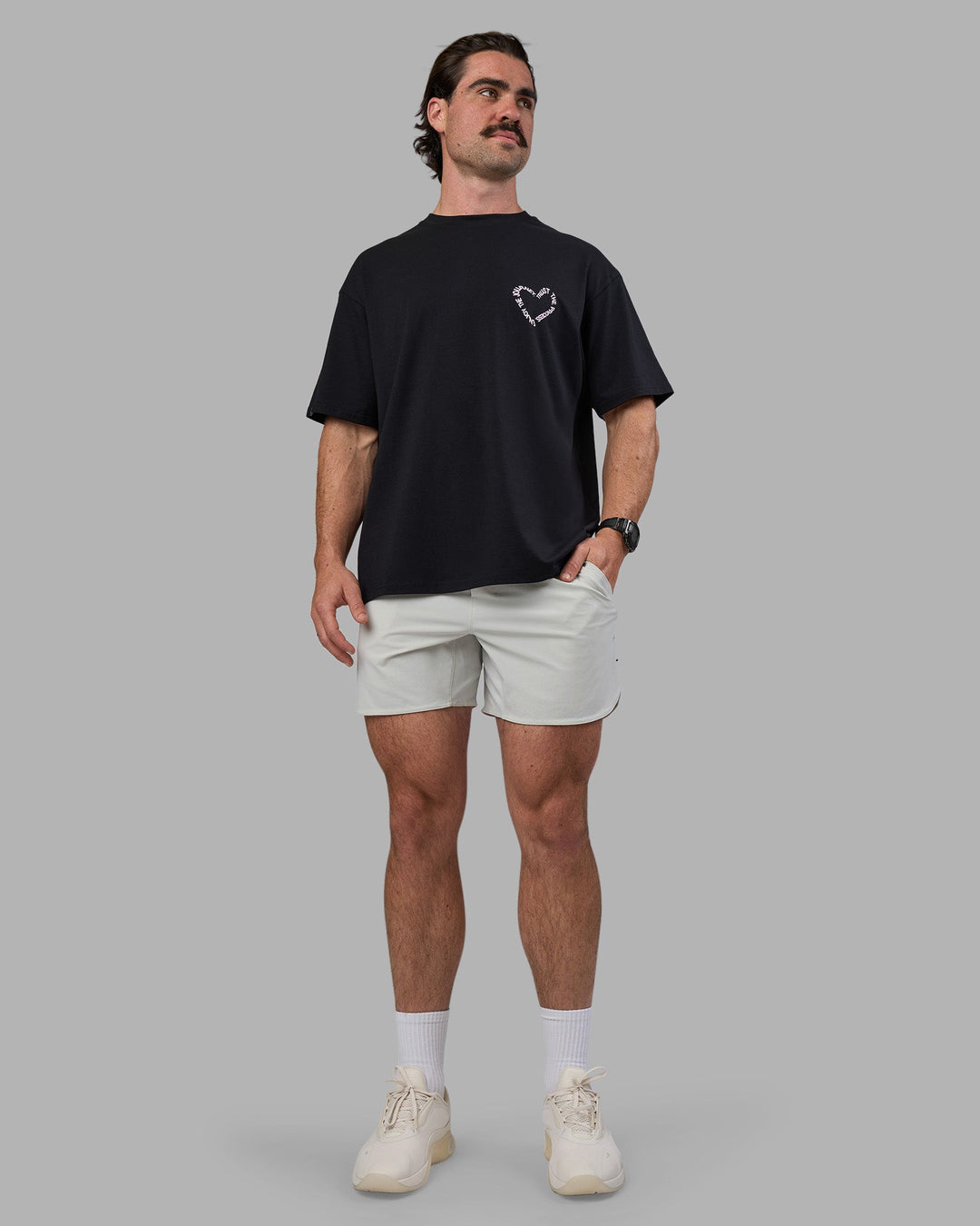 Man wearing Love The Process FLXCotton Oversize Tee - Black-Bubblegum | Model:Adam