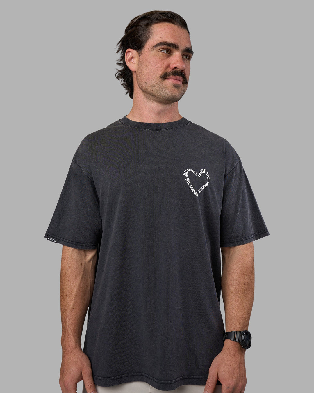 Man wearing Love The Process FLXCotton Oversize Tee - Black Washed-White | Model:Adam | Size:L