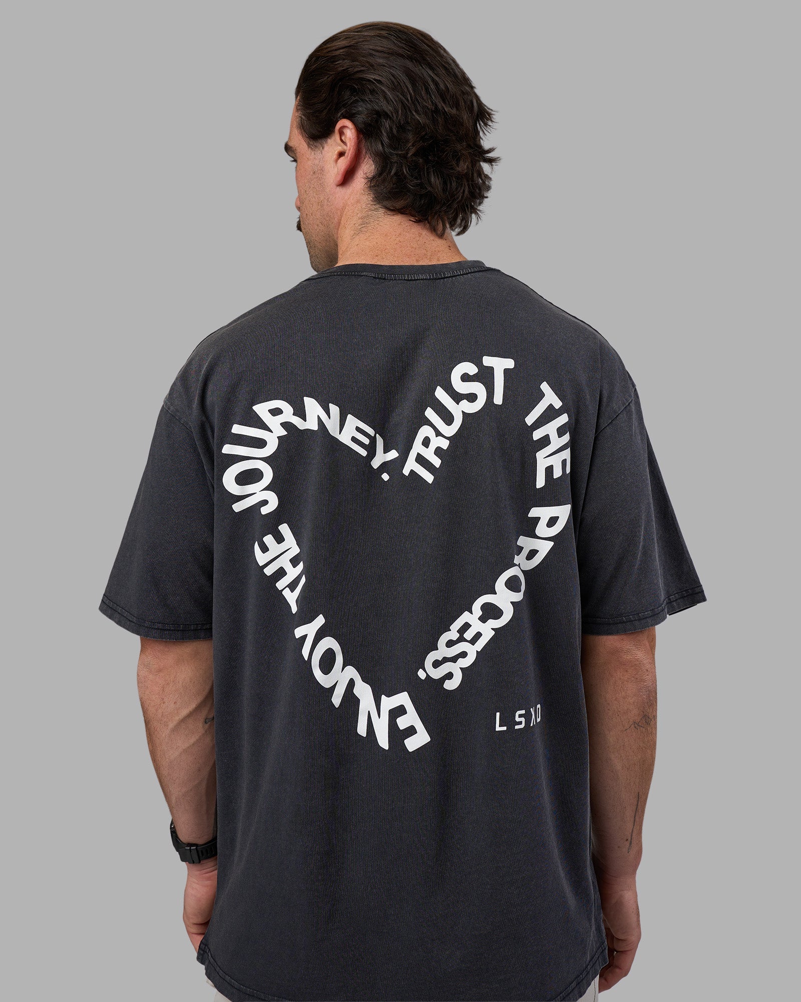 Man wearing Love The Process FLXCotton Oversize Tee - Black Washed-White | Model:Adam | Size:L
