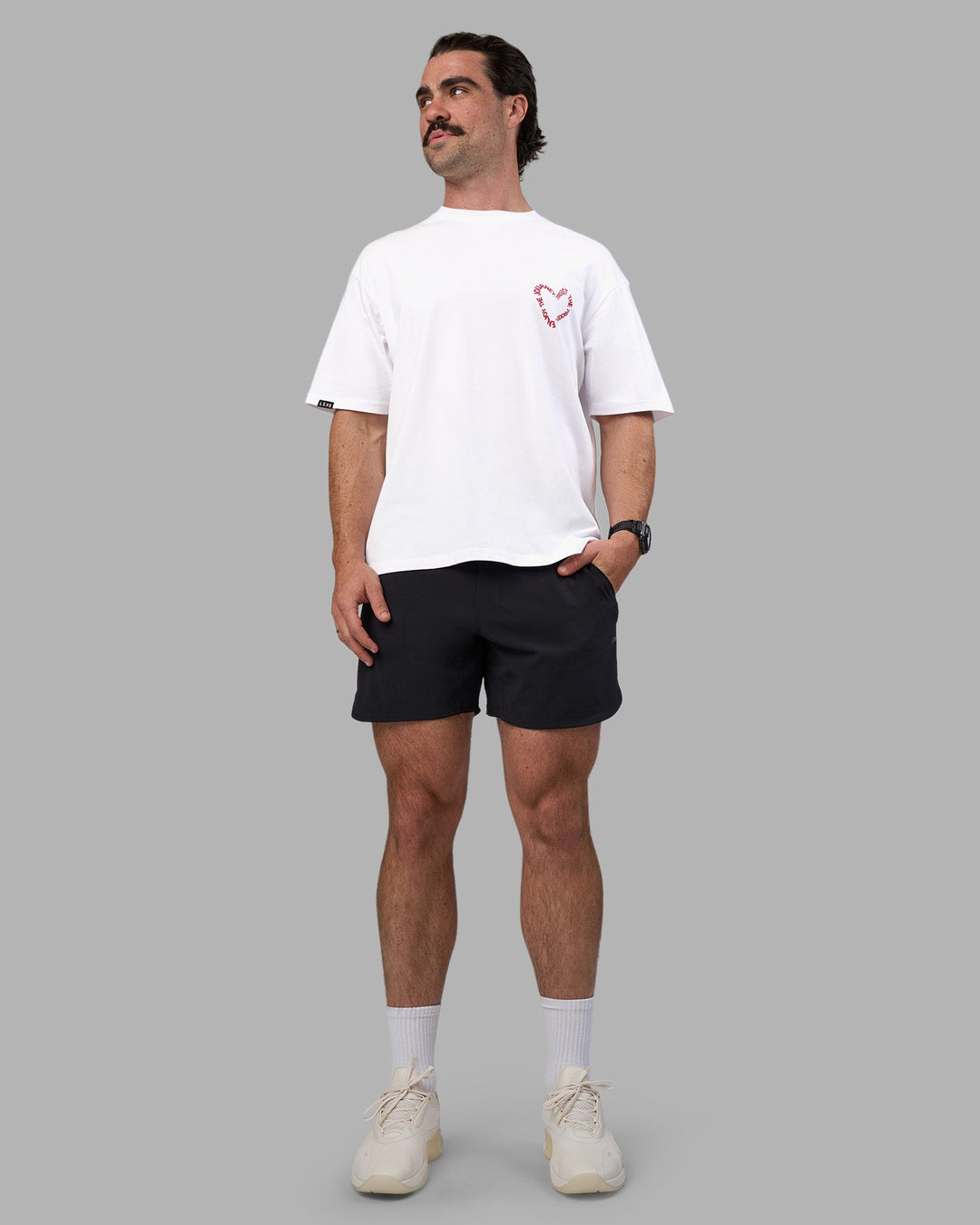 Man wearing Love The Process FLXCotton Oversize Tee - White-Scarlet | Model:Adam | Size:L