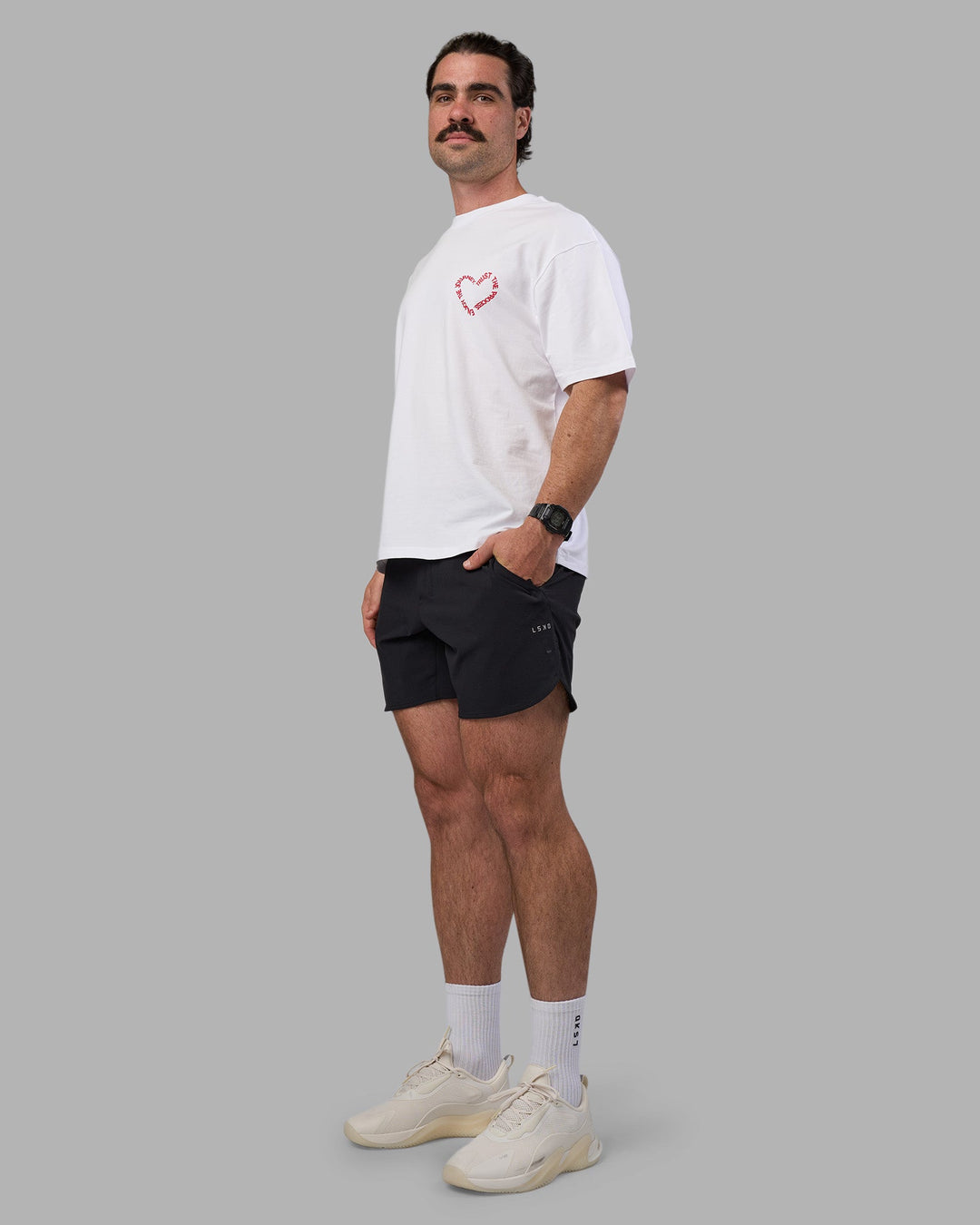 Man wearing Love The Process FLXCotton Oversize Tee - White-Scarlet | Model:Adam | Size:L