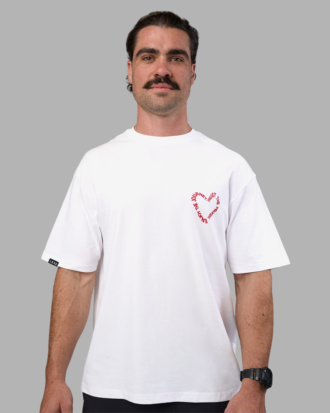 Man wearing Love The Process FLXCotton Oversize Tee - White-Scarlet | Model:Adam | Size:L