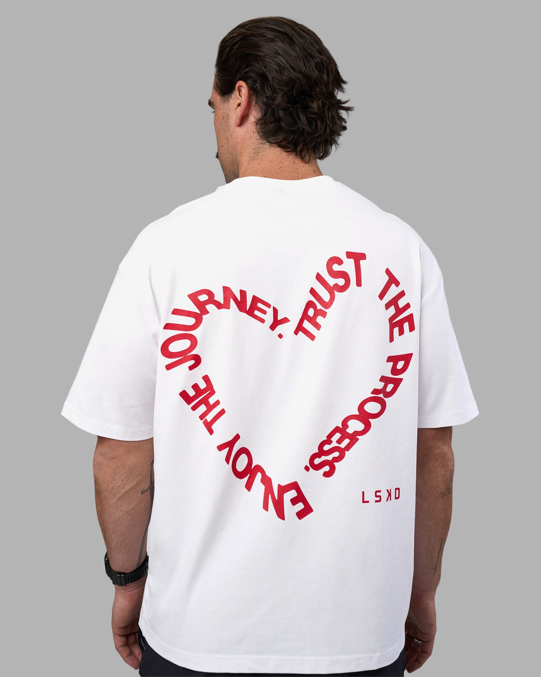 Man wearing Love The Process FLXCotton Oversize Tee - White-Scarlet | Model:Adam | Size:L