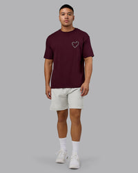 Man wearing Love The Process FLXCotton Oversize Tee - Cherry Lacquer-Shale Beige | Model:Kaelyb | Size:L