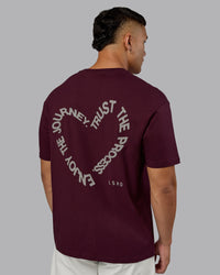 Man wearing Love The Process FLXCotton Oversize Tee - Cherry Lacquer-Shale Beige | Model:Kaelyb | Size:L