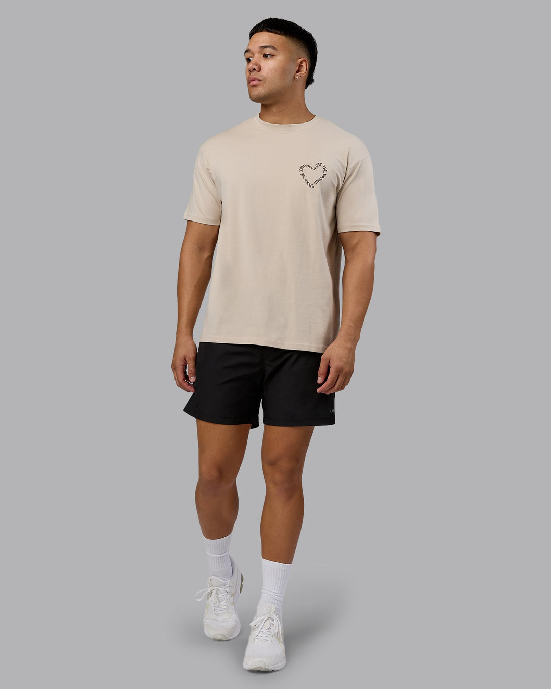 Man wearing Love The Process FLXCotton Oversize Tee - Shale Beige-Choc | Model:Kaelyb | Size:L