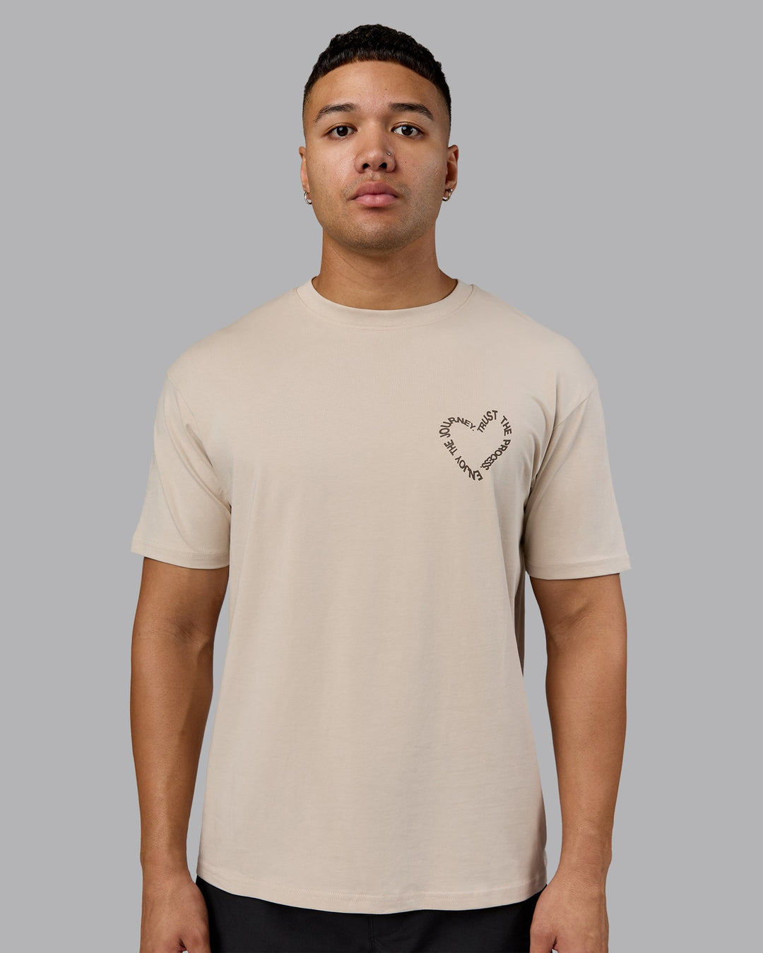 Man wearing Love The Process FLXCotton Oversize Tee - Shale Beige-Choc | Model:Kaelyb | Size:L
