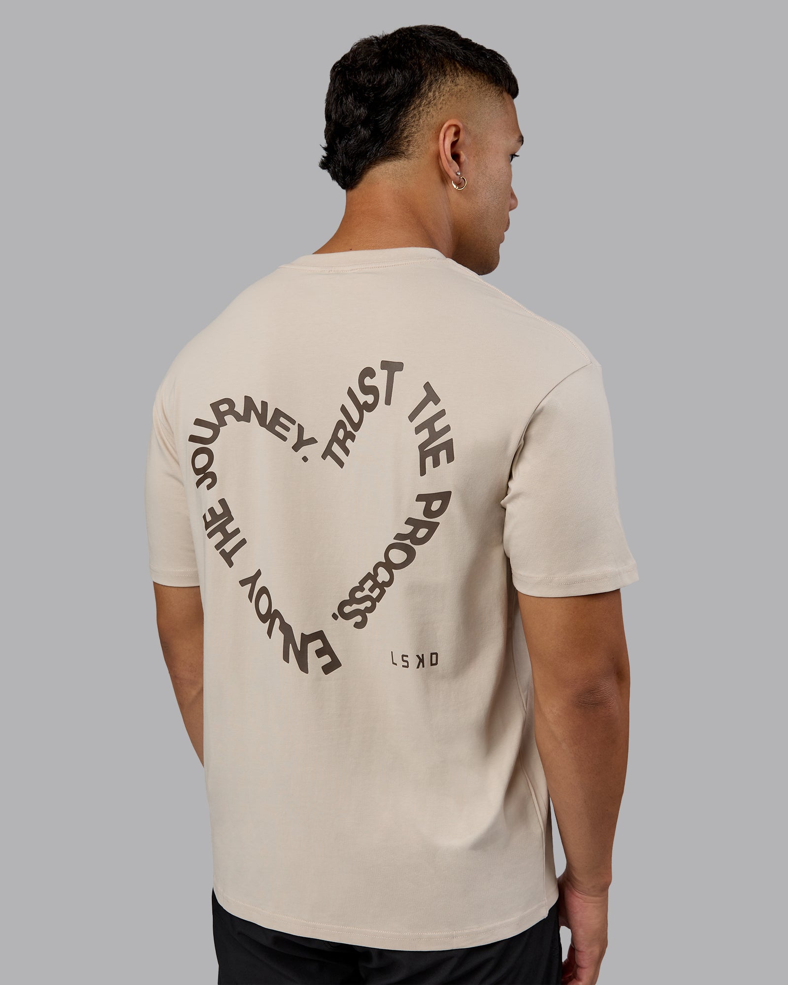 Man wearing Love The Process FLXCotton Oversize Tee - Shale Beige-Choc | Model:Kaelyb | Size:L