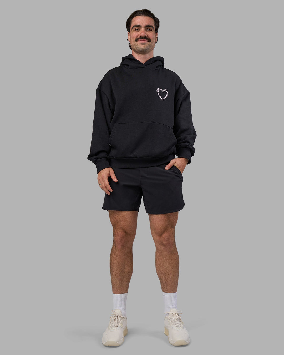 Man wearing Unisex Love The Process Oversize Hoodie - Black-Bubble Gum | Model:Adam | Size:L