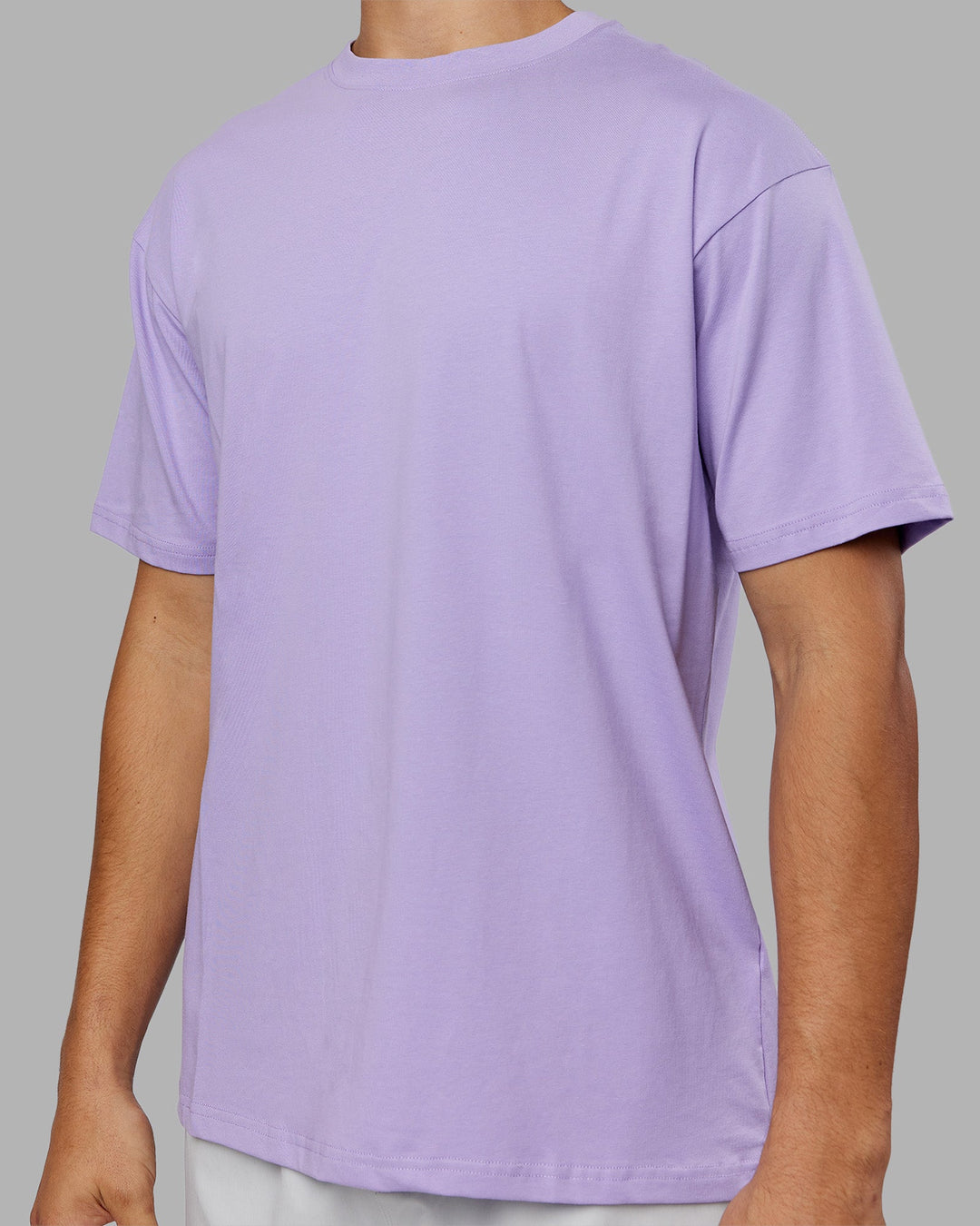 Man wearing Love The Run FLXCotton Tee Oversize - Violet Ray-Royal Purple | Model:Jackson | Size:L