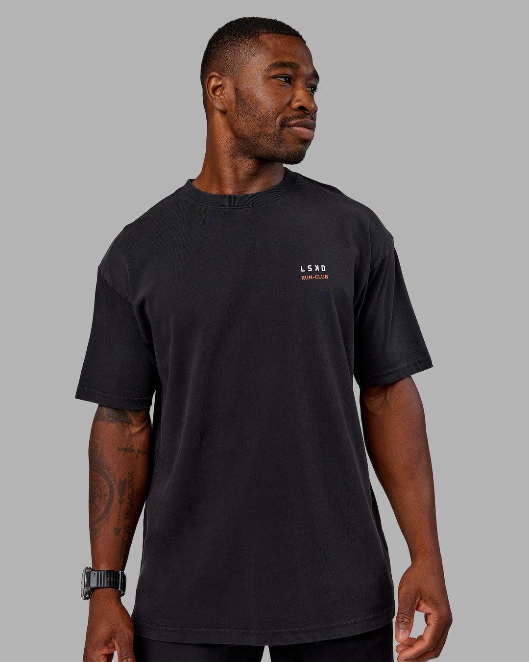Man wearing Love this S**t Washed Heavyweight Oversized Tee - Washed Black-Ultra Orange | Model:Sam | Size:L