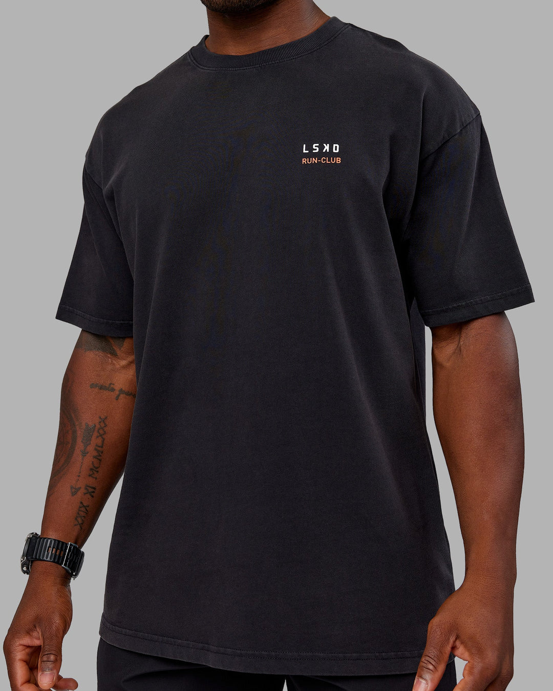 Man wearing Love this S**t Washed Heavyweight Oversized Tee - Washed Black-Ultra Orange | Model:Sam | Size:L