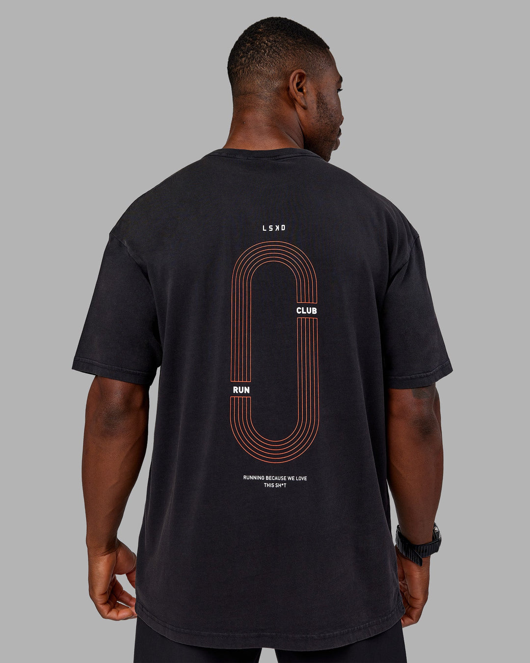 Man wearing Love this S**t Washed Heavyweight Oversized Tee - Washed Black-Ultra Orange | Model:Sam | Size:L