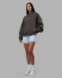 Woman wearing MVP Oversized Hoodie - Dark Storm | Model:Rhiley | Size:L