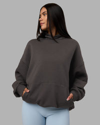 Woman wearing MVP Oversized Hoodie - Dark Storm | Model:Rhiley | Size:L