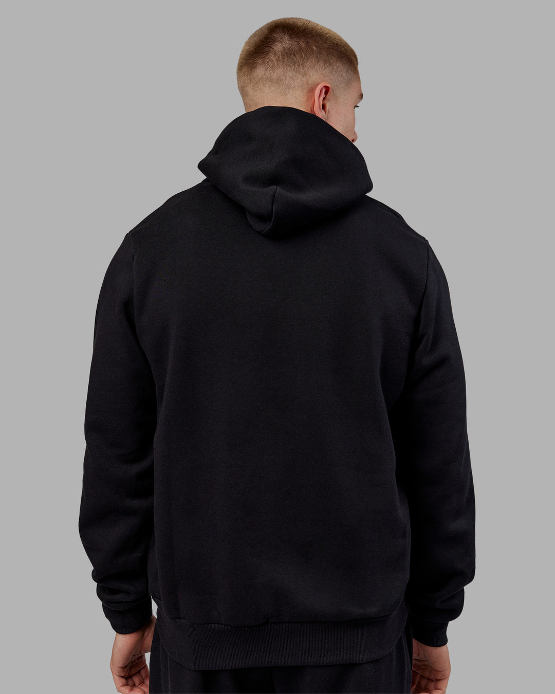 Man wearing MVP Regular Fit Hoodie - Black | Model:Tom | Size:L