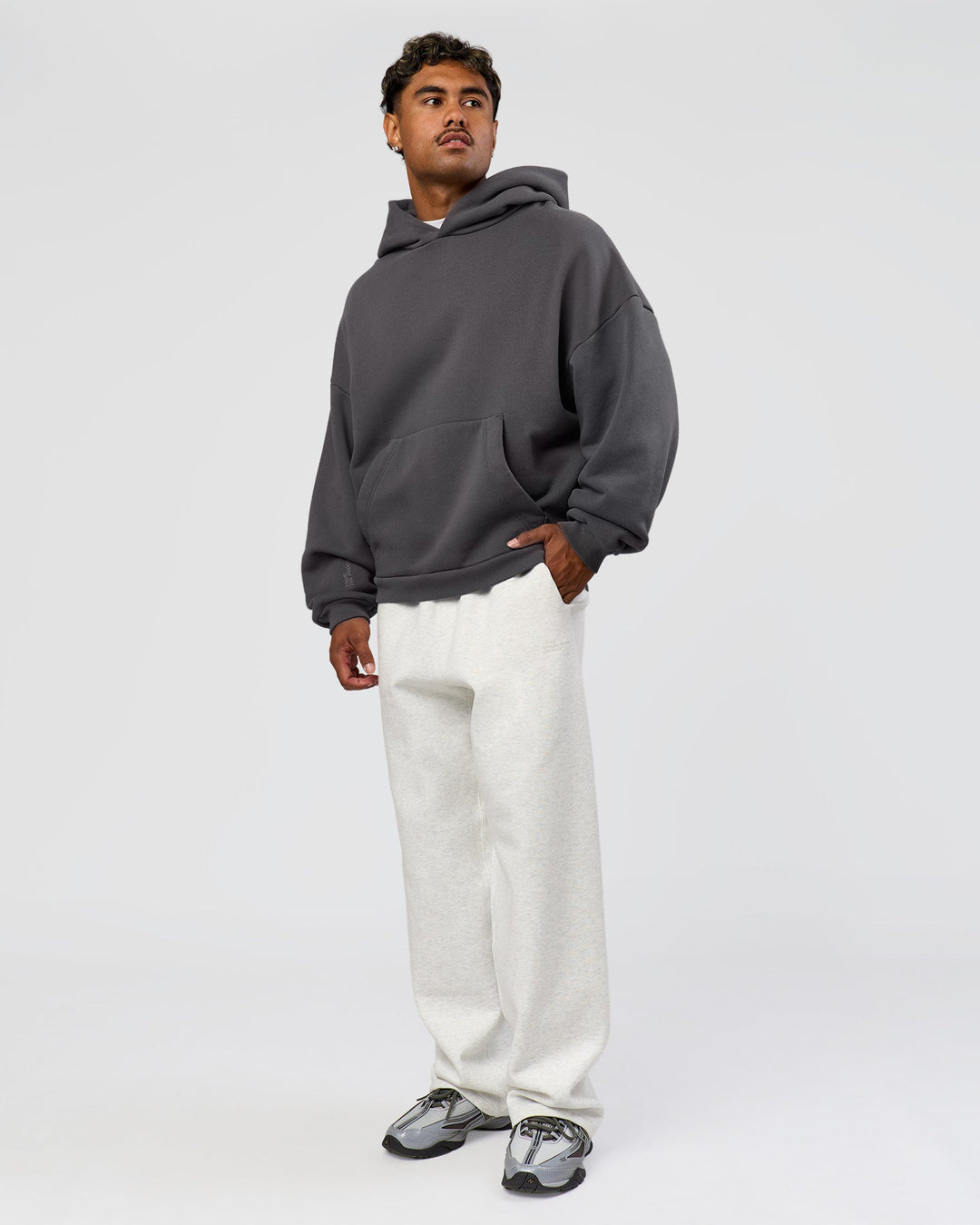 Man wearing Memory In Motion Ultra Heavyweight Washed Hoodie - Dark Storm Washed | Model:Xav | Size:L