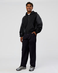 Man wearing Memory in Motion Ultra Heavyweight Zip Thru Hoodie - Black Washed | Model:Xav | Size:L