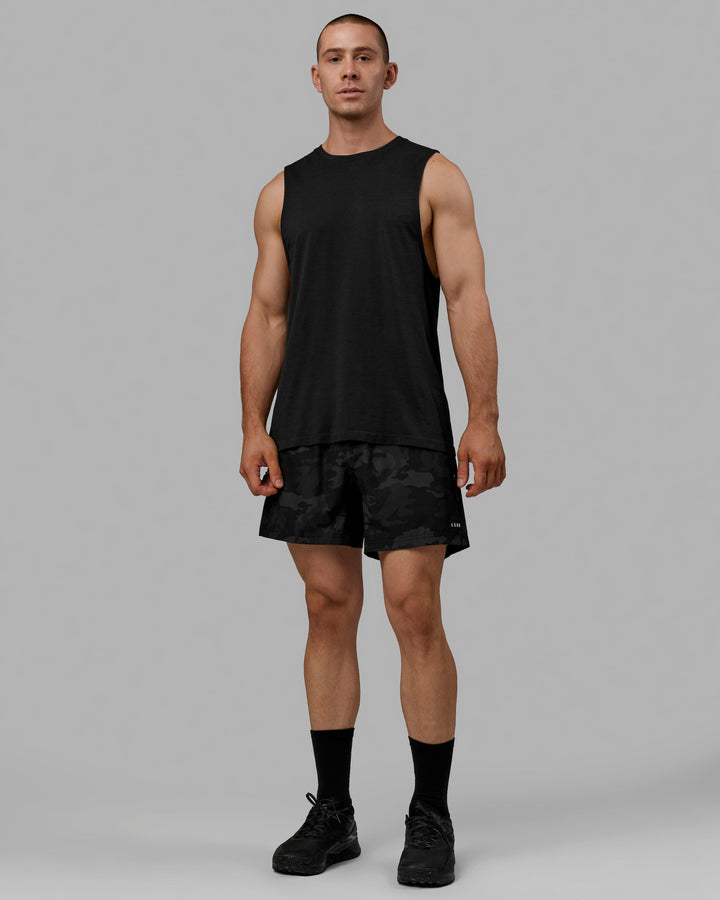 Man wearing AeroFLX+ Seamless Muscle Tank - Black Marl
