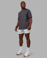 Man wearing Base FLXCotton Tee Oversized - Dark Storm | Model:Sam | Size:L