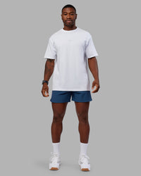 Man wearing Base FLXCotton Tee Oversized - White | Model:Sam | Size:L