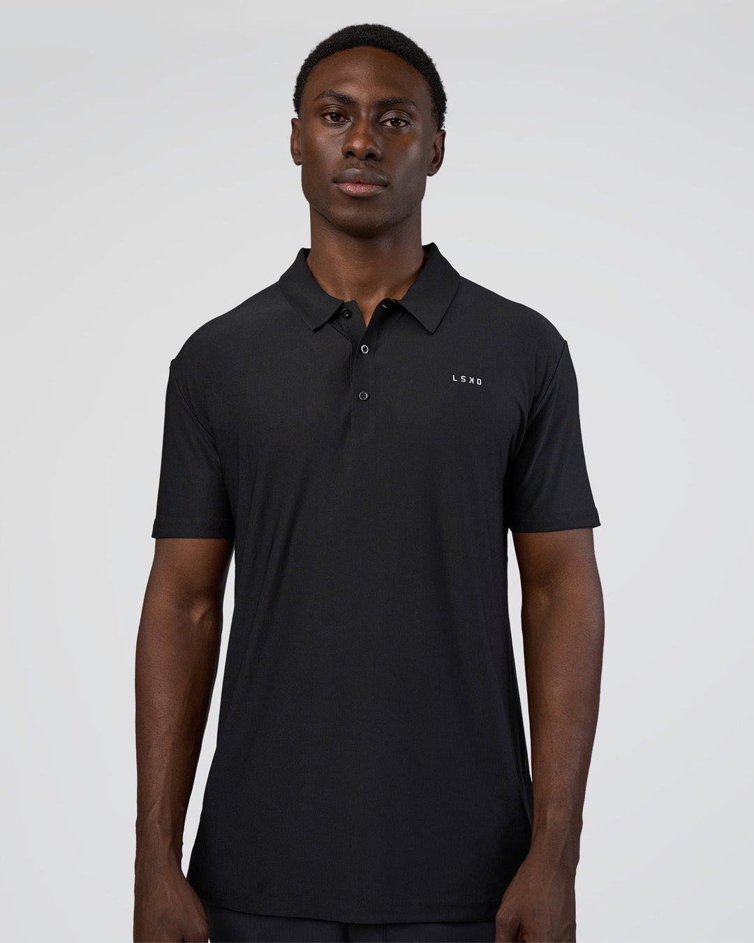 Man wearing Drive Polo - Black | Model:Paabio | Size:L