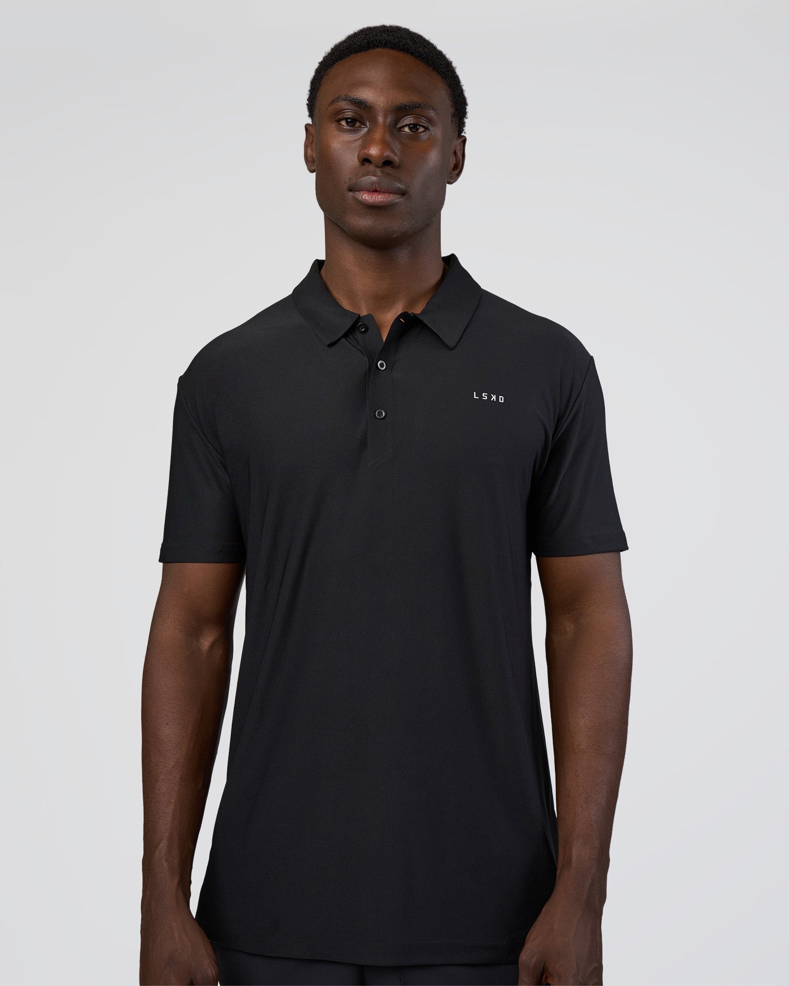 Man wearing Drive Polo - Black | Model:Paabio | Size:L