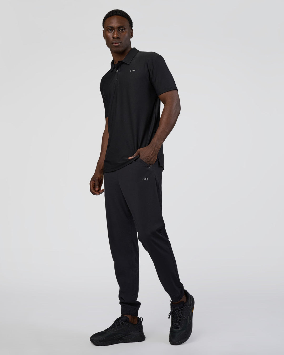 Man wearing Drive Polo - Black | Model:Paabio | Size:L