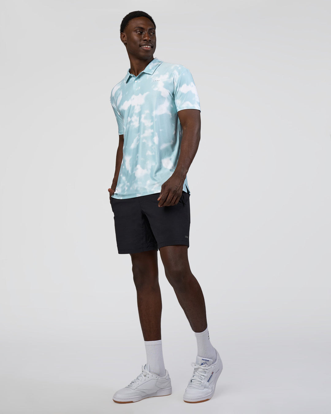 Man wearing Drive Polo - Sky Washed Camo | Model:Paabio | Size:L