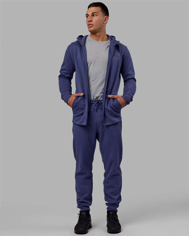 Man wearing Athlete ForgedFleece Zip Jogger - Future Dusk