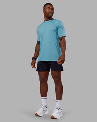 Man wearing Pace Running Tee - Retro Blue | Model:Sam | Size:L