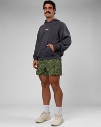 Man wearing Miami Vibe Oversized Hoodie - Dark Storm-Marshmallow | Model:Adam | Size:L