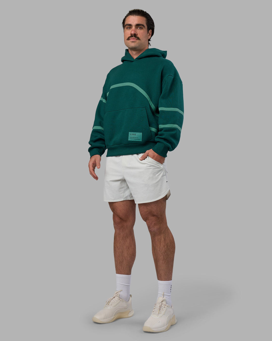 Man wearing Movement Oversized Hoodie - Dark Moss-Agate Green | Model:Adam | Size:L