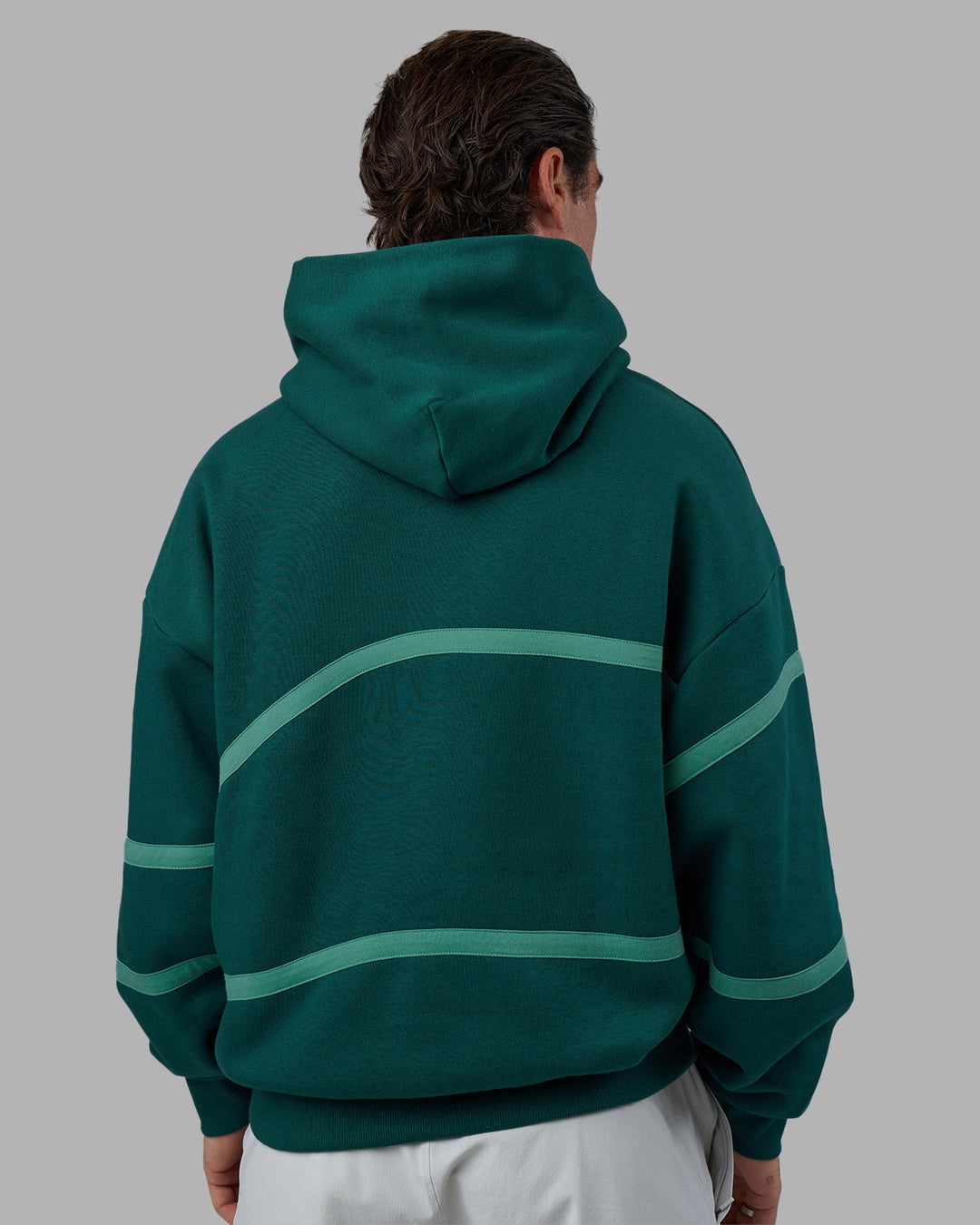 Man wearing Movement Oversized Hoodie - Dark Moss-Agate Green | Model:Adam | Size:L