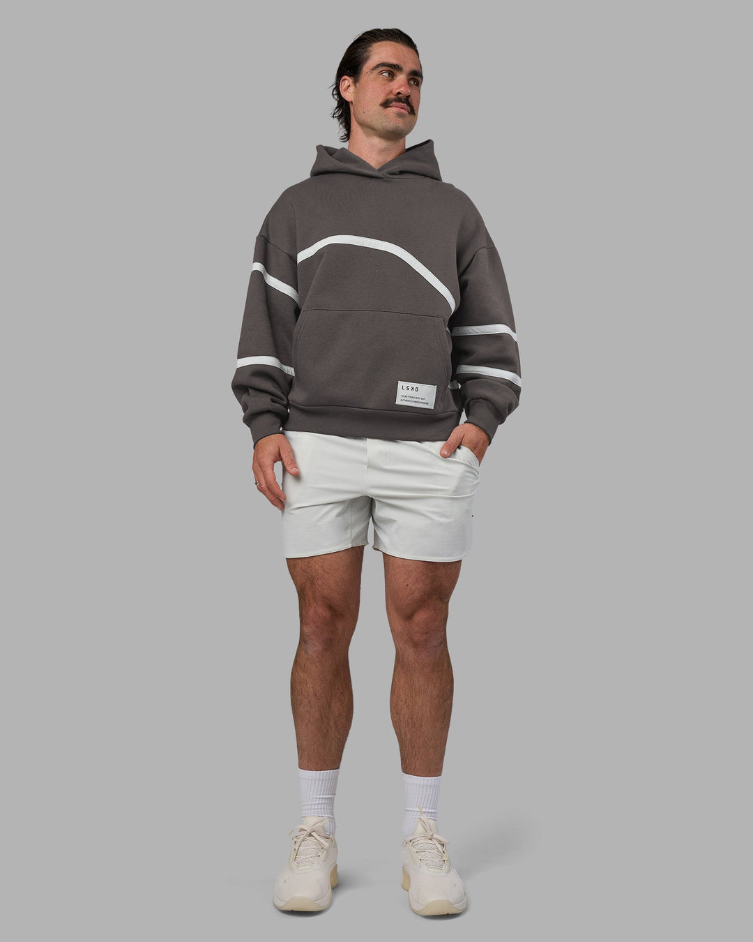 Man wearing Movement Oversized Hoodie - Dark Storm-Digital Mist | Model:Adam | Size:L
