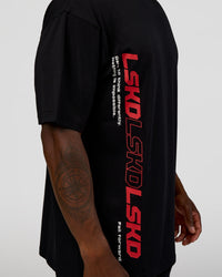 Man wearing Nothing Is Impossible FLXCotton Oversized Tee - Black-Flame | Model:Sam | Size:L