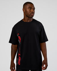 Man wearing Nothing Is Impossible FLXCotton Oversized Tee - Black-Flame | Model:Sam | Size:L