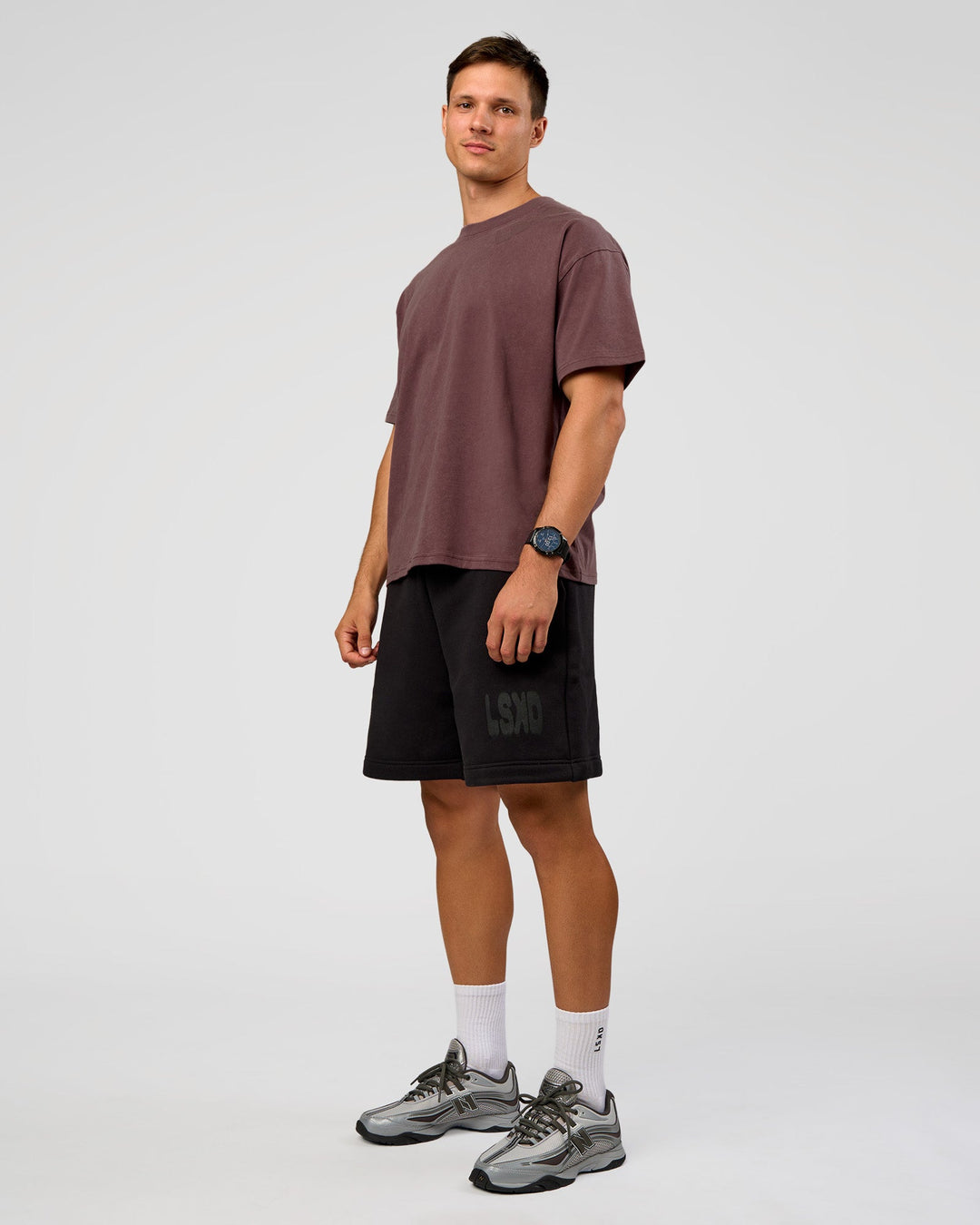 Man wearing Offset Heavyweight Unisex Oversized Tee - Cocoa Powder-Cocoa Powder | Model:Liam | Size:L
