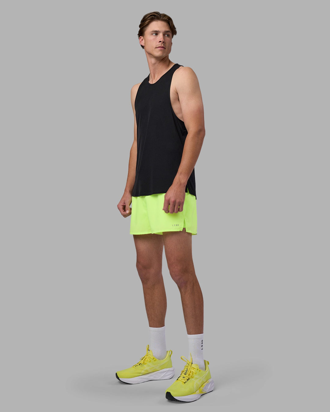 Man wearing Pace 3&quot; Performance Short - Lime Glo | Model:Brandon | Size:L